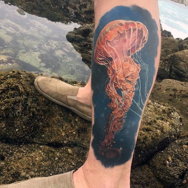 Big multicolored 3D like big jelly-fish tattoo on leg