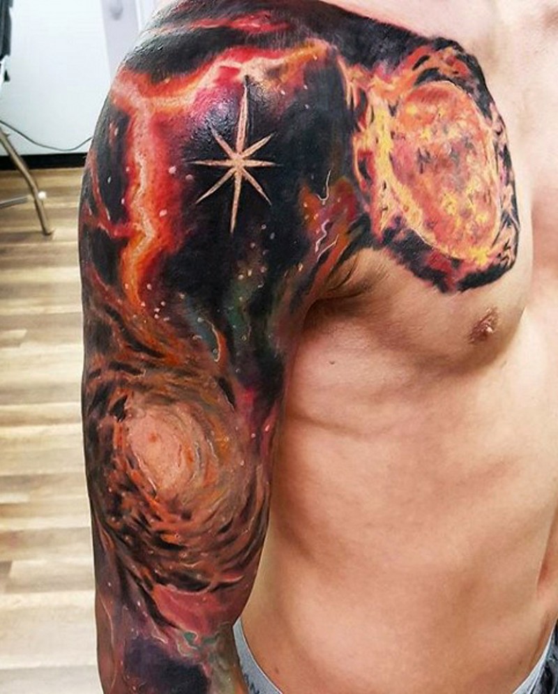 Big multicolored deep space tattoo on sleeve and chest