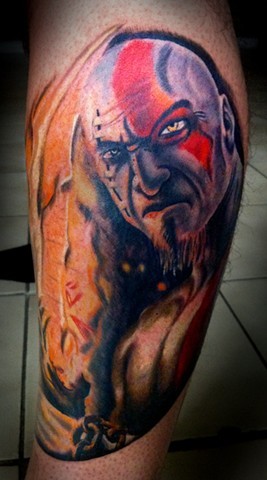 Big multicolored natural looking barbarian tattoo on leg muscle