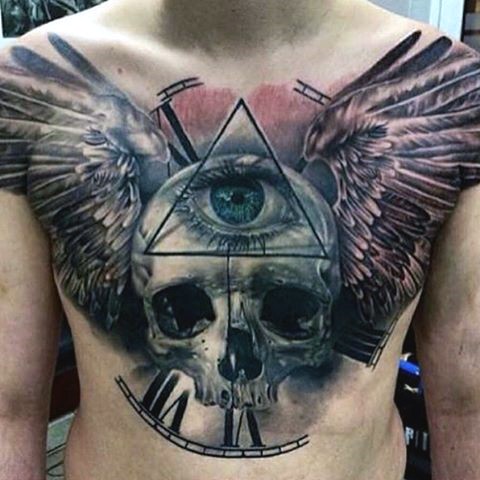 Big mystical combined skull with wings and Masonic pyramid tattoo on chest