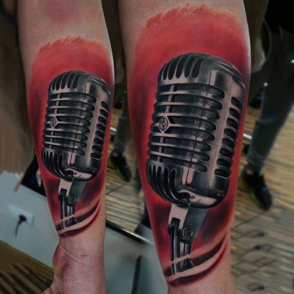 Big natural looking colored microphone tattoo on arm