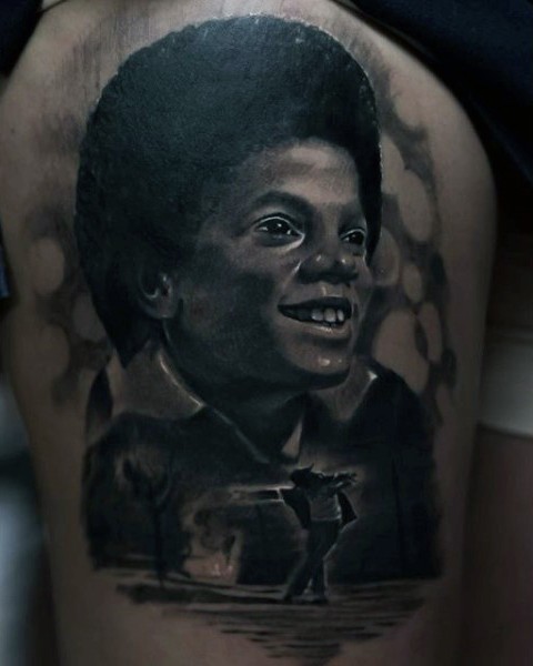 Big real photo like little Michael Jackson portrait tattoo on thigh