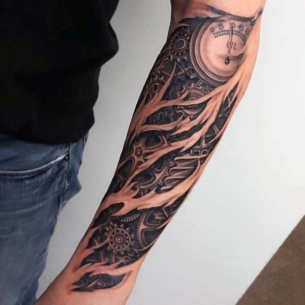 Big realistic looking black and white mechanical tattoo on sleeve