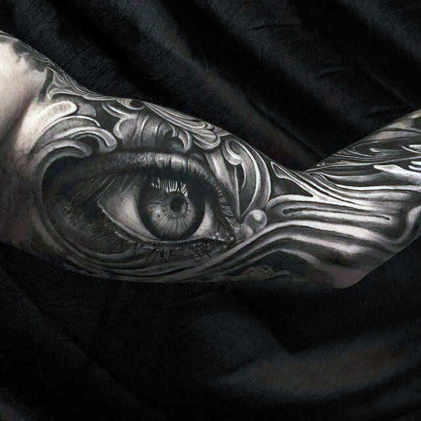 Tatuaje en el brazo, ojo grande impresionante negro blanco