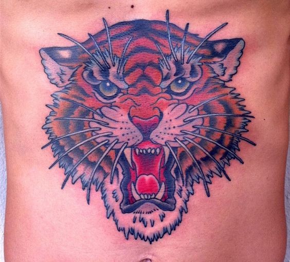 Tatuaje en el vientre, 
cara de tigre enfadado grande