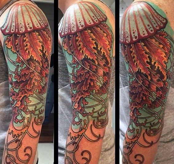Big very detailed and colored beautiful jellyfish tattoo on sleeve