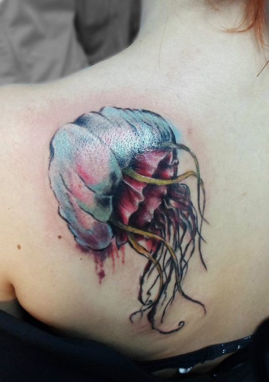 Big very realistic detailed colored jelly-fish tattoo on shoulder