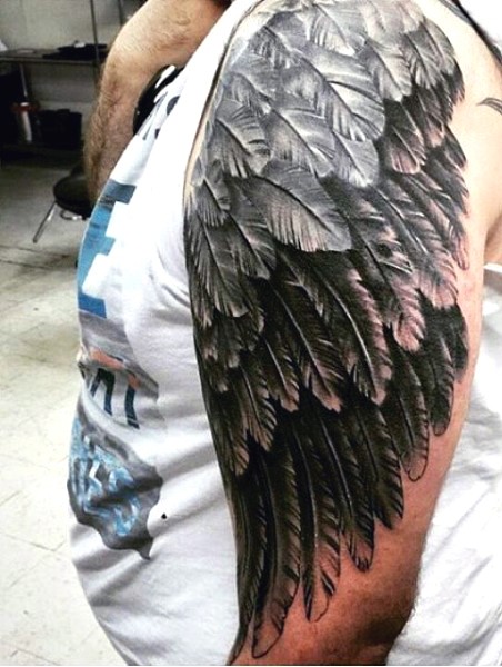 Big very realistic looking black ink feather wing half sleeve like tattoo