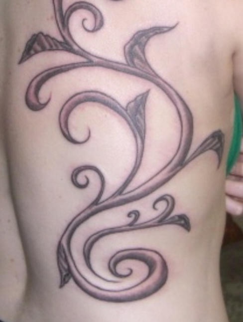Black and gray big vine tattoo on back