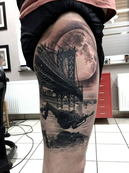 Black and gray style big thigh tattoo of woman falling from bridge