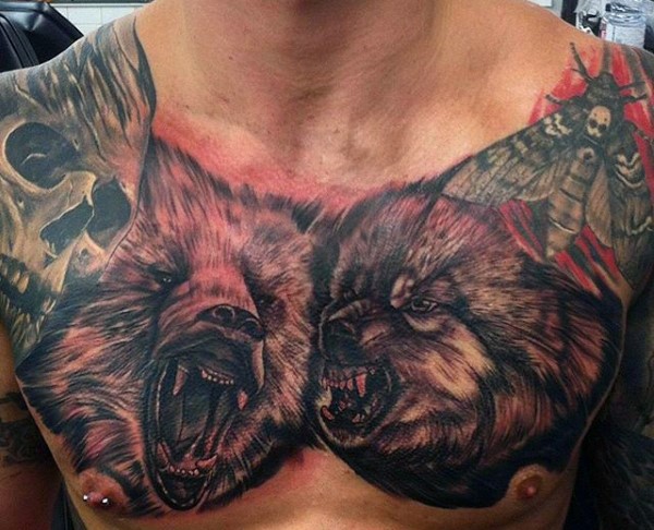 Black and gray style chest tattoo of evil wolves