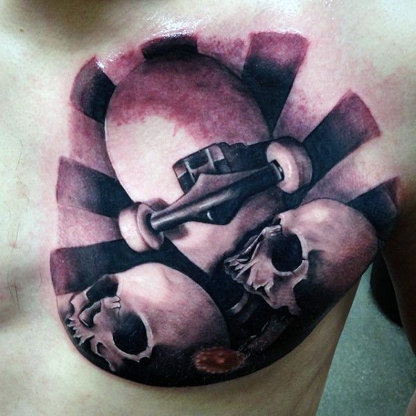 Black and gray style colored chest tattoo of skateboard with human skulls