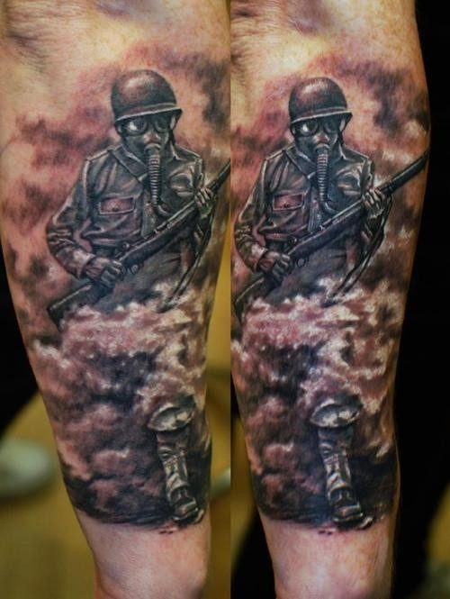 Black and gray style colored forearm tattoo of vintage warrior in gas mask