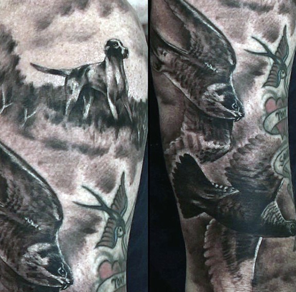 Black and gray style colored leg tattoo of various birds and animals