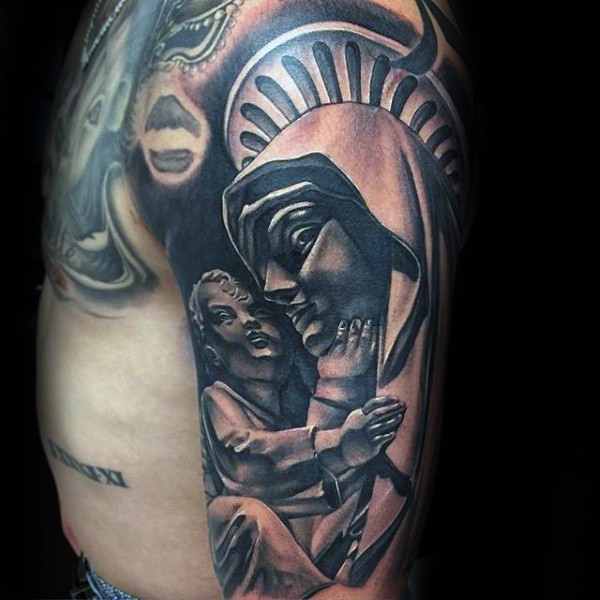 Black and gray style colored shoulder tattoo of saint woman with child statue