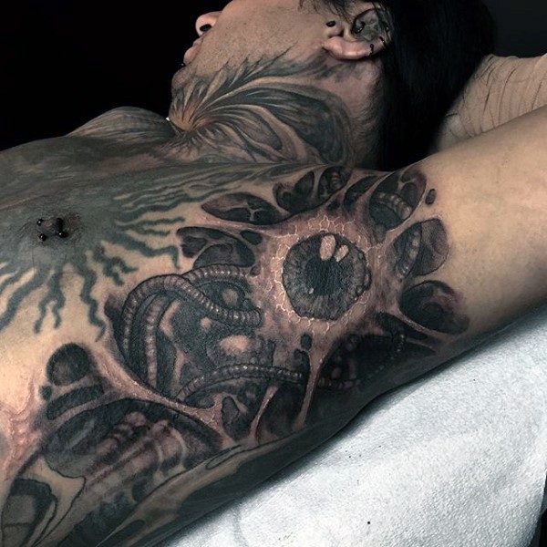 Black and gray style colored side tattoo of alien eye