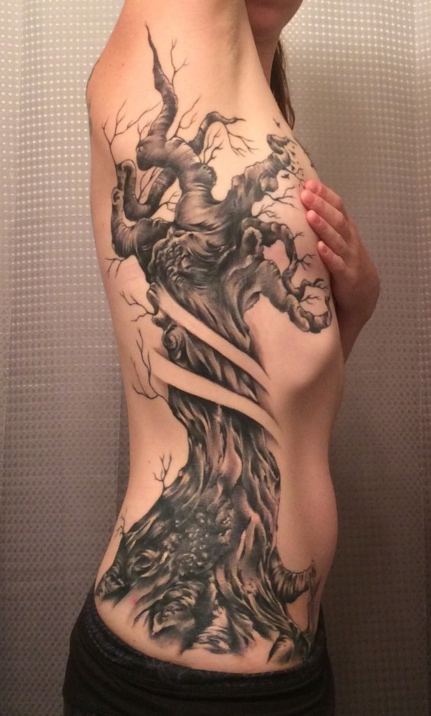 Black and gray style colored side tattoo of corrupted old tree