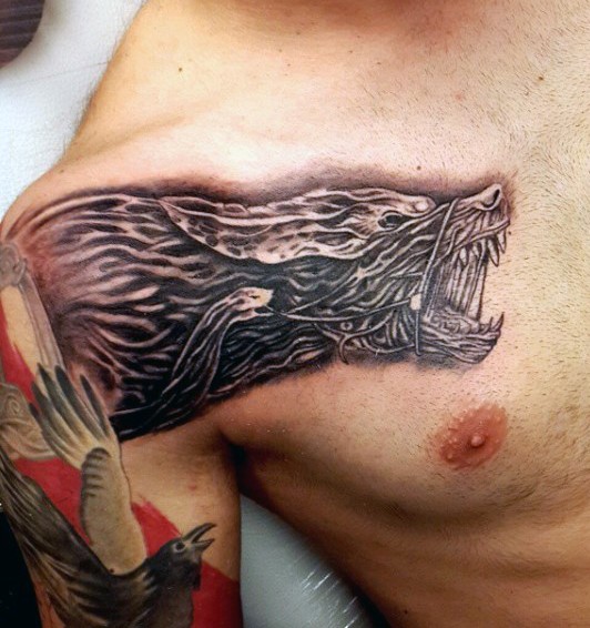 Black and gray style cool looking demonic wolf tattoo on shoulder and chest