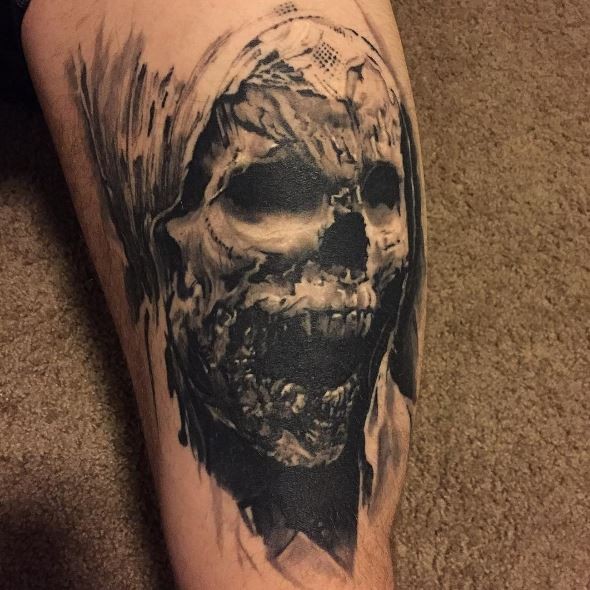 Black and gray style detailed arm tattoo of monster mummy