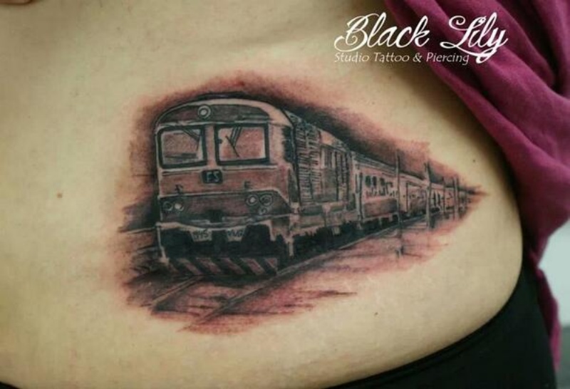 Black and gray style detailed belly tattoo of old USSR train