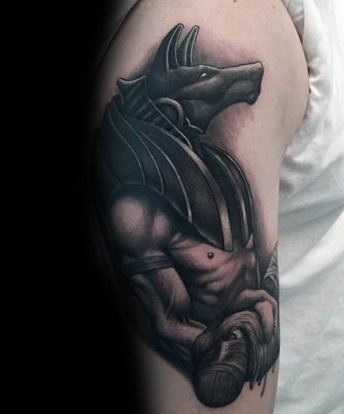 Black and gray style detailed shoulder tattoo of Egypt Anubis God