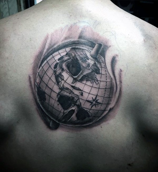 Black and gray style detailed upper back tattoo of big globe