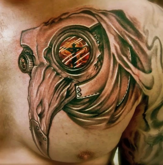 Black and gray style interesting looking plague doctor tattoo on chest