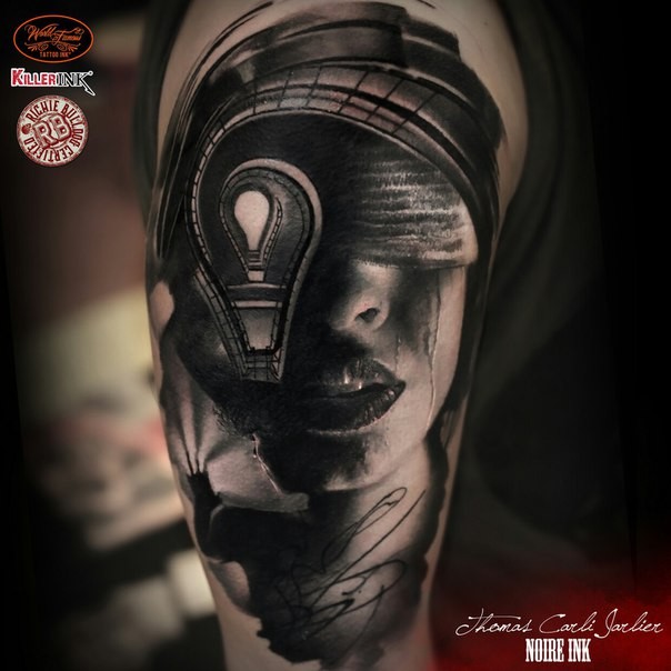Black and gray style shoulder tattoo of woman face with lock hole