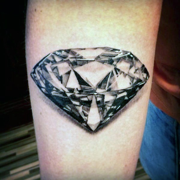 Black and white detailed diamond tattoo