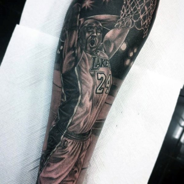 Black and white forearm tattoo of Michael Jordan player