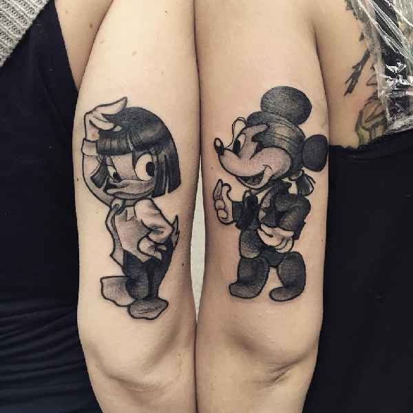 Black and white interesting looking Disney cartoons heroes tattoo