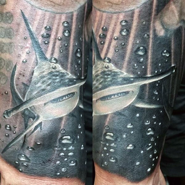 Black and white realistic looking forearm tattoo of hammerhead shark