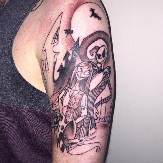Black and white shoulder tattoo of Nightmare before Christmas heroes