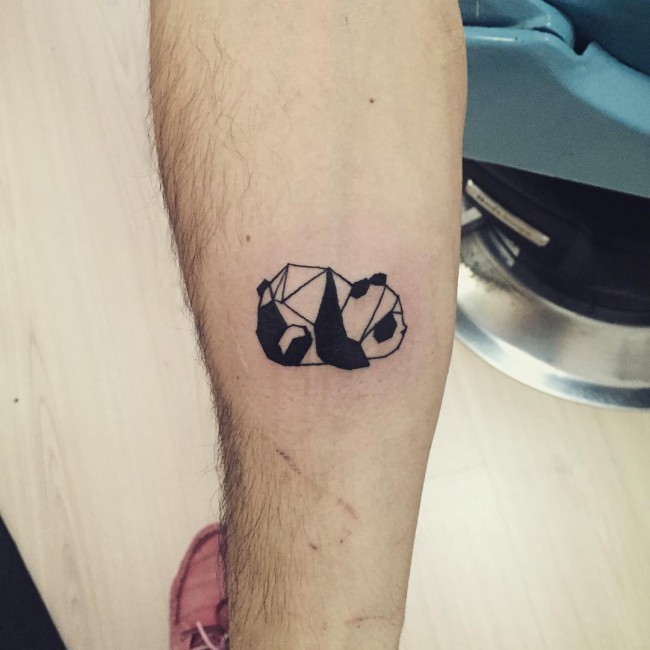 Black and white small panda tattoo on calve in geometrical style