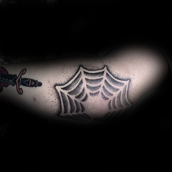 Black and white spiderweb tattoo in dotted work style