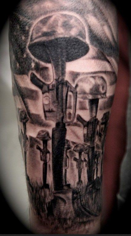 Black army memorial tattoo on arm