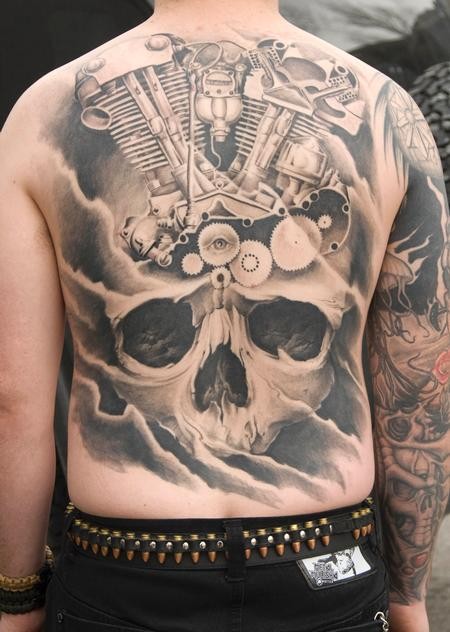 Black gray big skull with various mechanisms tattoo on back