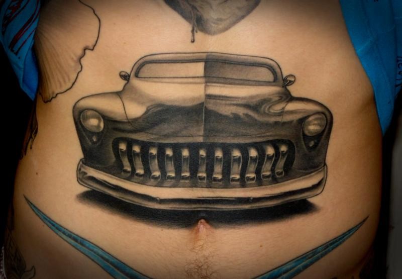 Black gray car tattoo on stomach