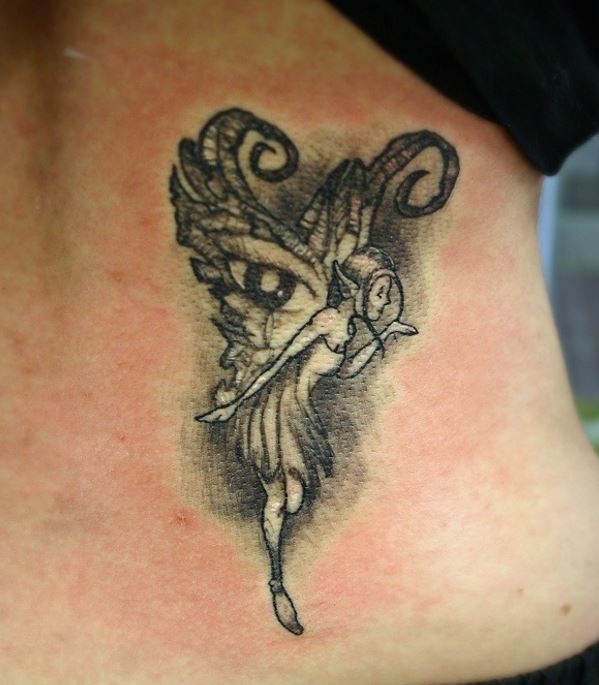 Black gray fairy tattoo on ribs