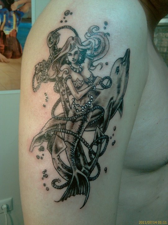 Black gray mermaid tattoo on arm