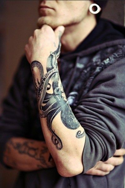 Black gray octopus forearm tattoo for men