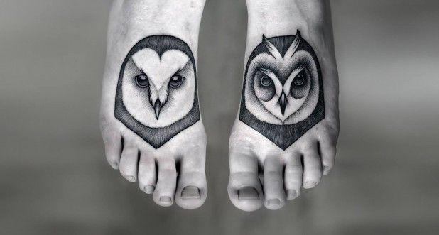 Black gray owls head tattoo on feet by Kamil Czapiga