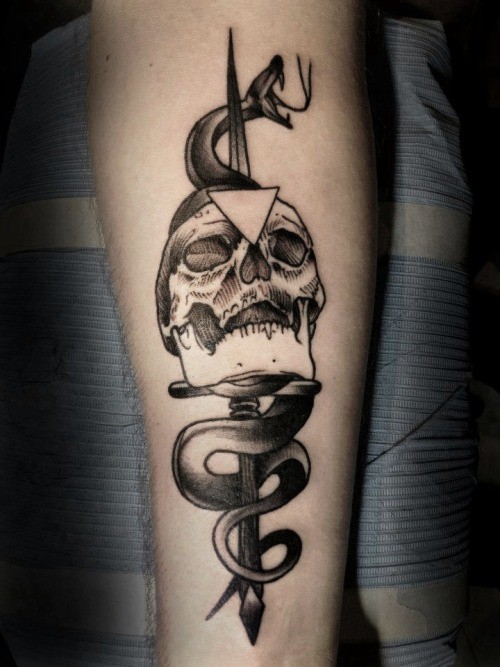 Black gray skull pierced by a dagger and snake tattoo