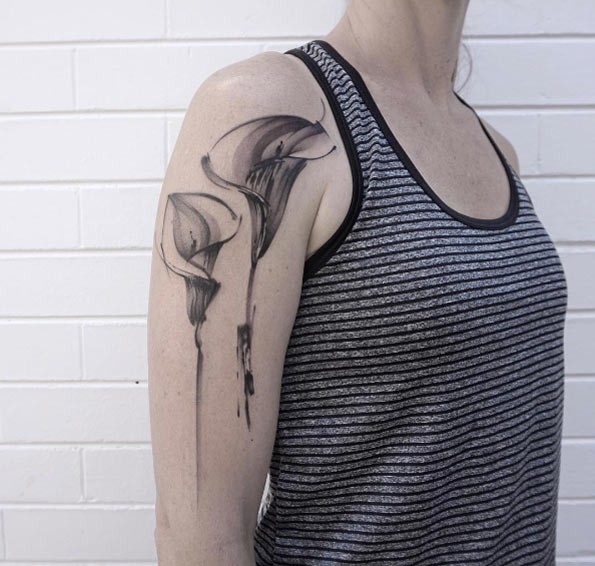 Black ink beautiful looking shoulder tattoo of beautiful flowers