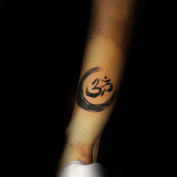 Black ink circle shaped leg tattoo of Asian symbol
