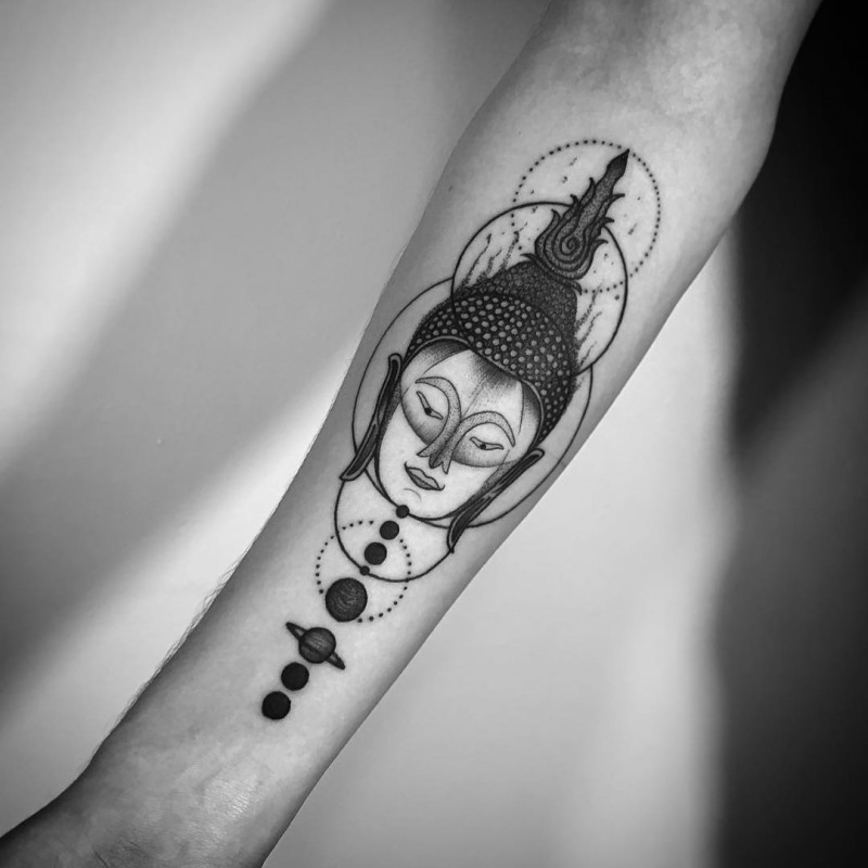 Black ink cool looking forearm tattoo of Buddha head with planet parade
