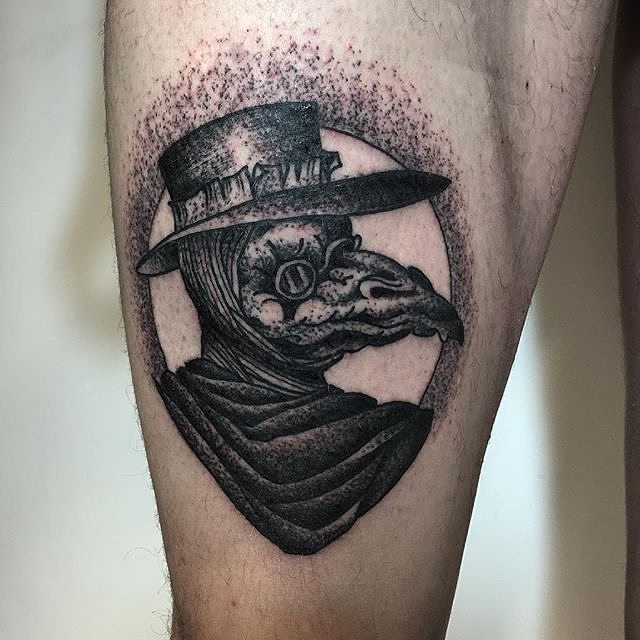 Black ink dot style thigh tattoo of plague doctors portrait