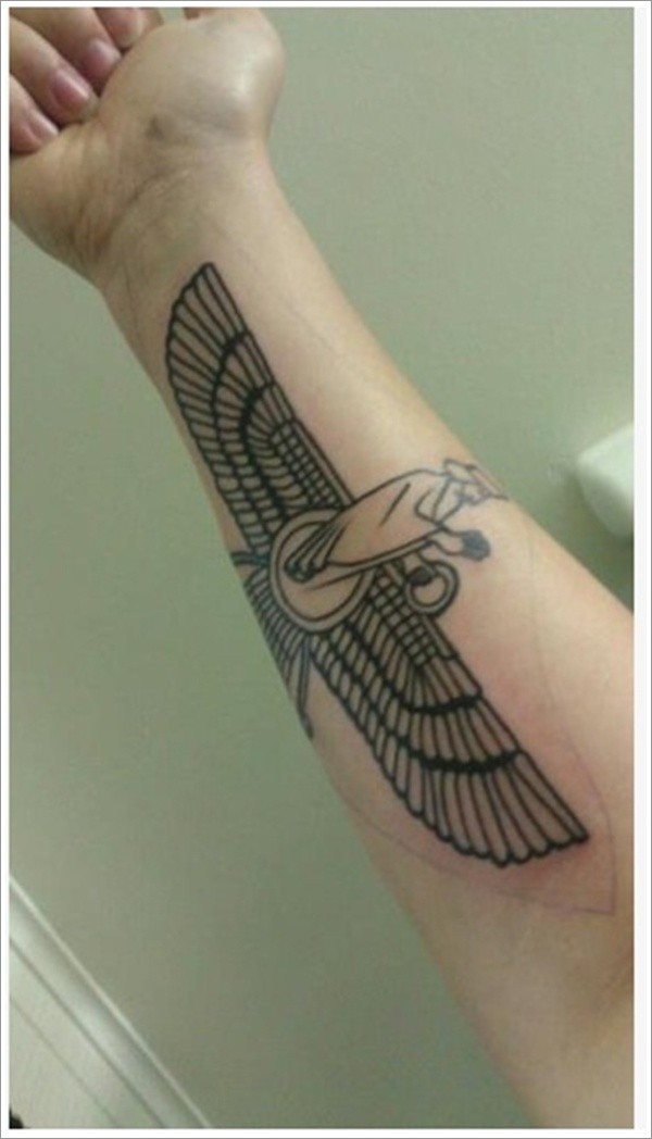 Black ink egyptian deity forearm tattoo
