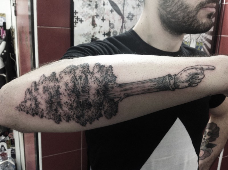 Black ink engraving style arm tattoo of big tree combined with arm
