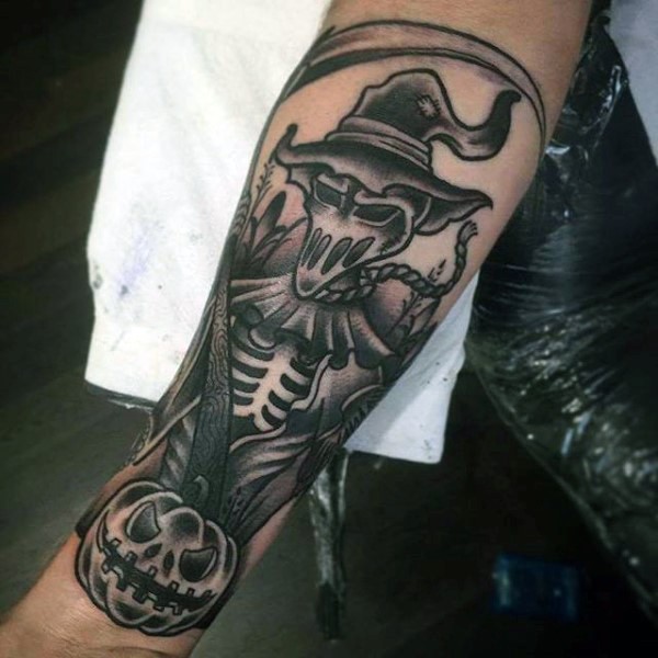 Black ink engraving style forearm tattoo of Death skeleton with pumpkin